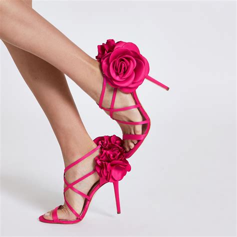 pink designer heel sandals.